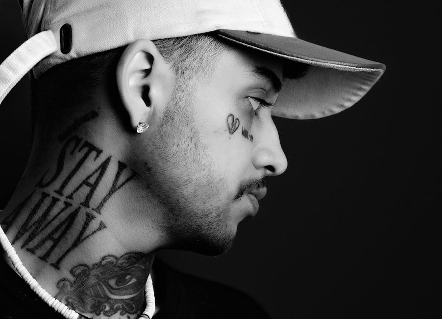 Zayn Malik almost hit in the head as water bottles are hurled at him at London event